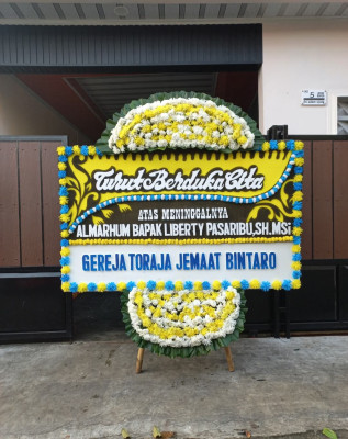 Papan Bunga Duka di Talumolo
